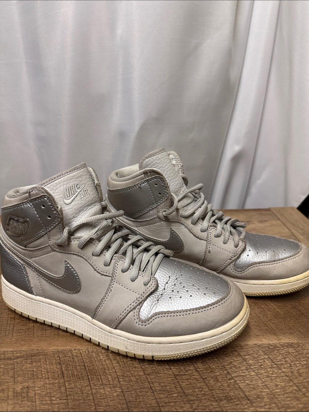 Nike Air Jordan 1 High Top Sneakers in Metallic Gray and Silver